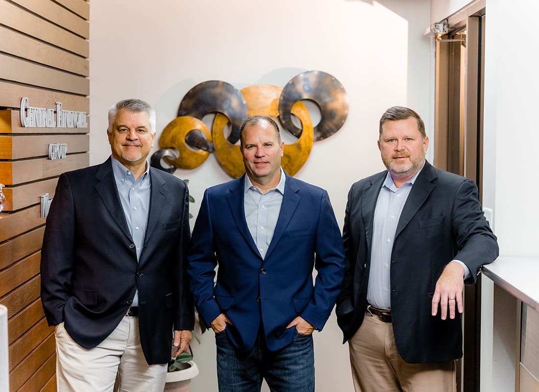 Johnston, IA - Smiling Group Portrait of Insurance Advisors Inside the CFG Office in Johnston Iowa
